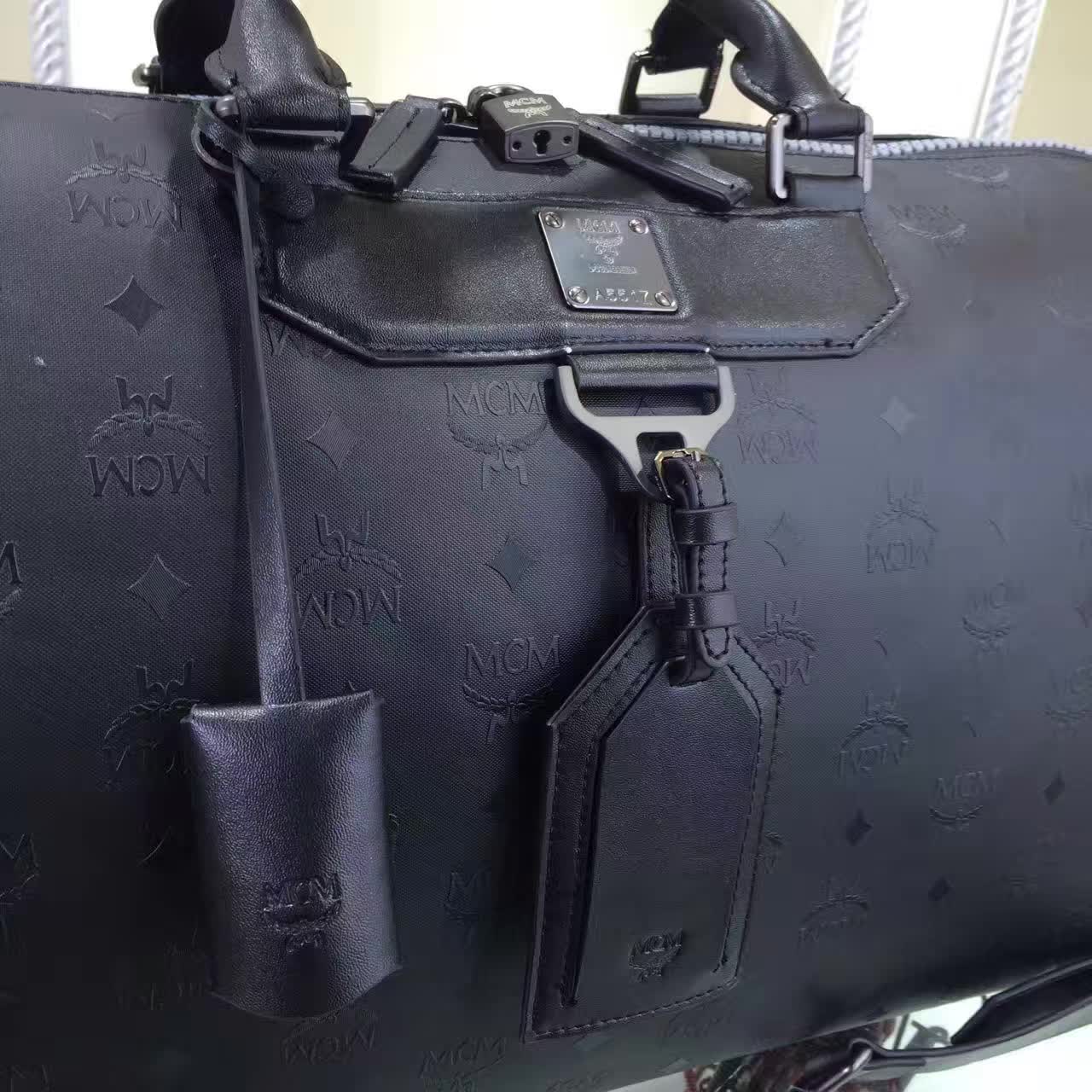 MCM男包 Nomad系列旅行袋 PVC配牛皮内里猪皮 铜牌独立编码 黑胶