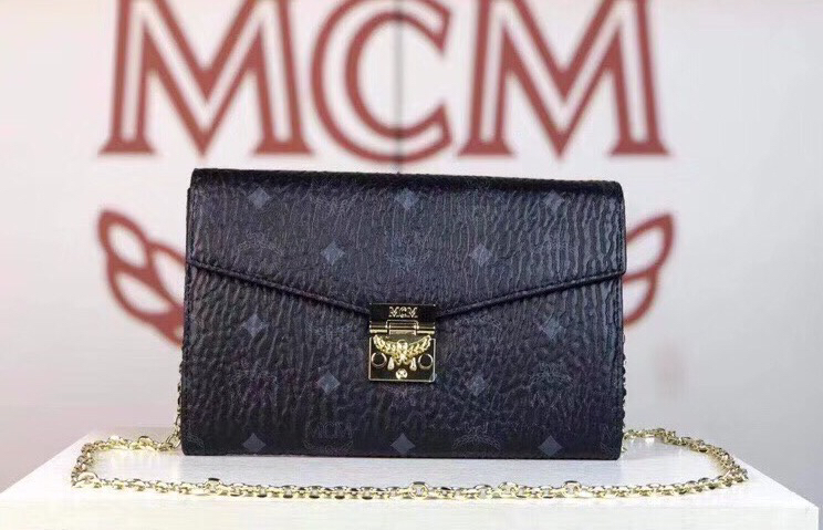 MCM Patricia系列 斜挎包单肩包折叠翻盖钱包 采用涂层帆布制成 风琴式隔层 黑色
