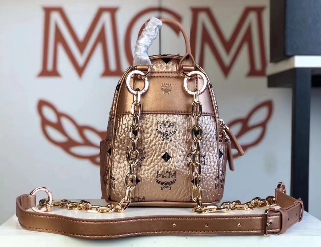 MCM 2019 新款 Essential X-mini 单肩/斜挎包（香槟金）采用 MCM标志性Visetos印花设计 配有多功能肩带 可斜挎或手拎使用